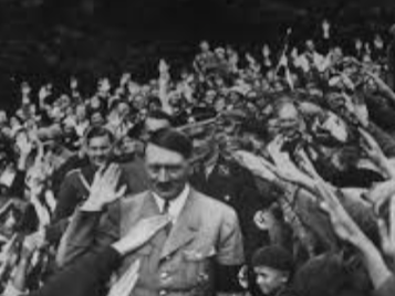 Image of Adolf Hitler surrounded by people
